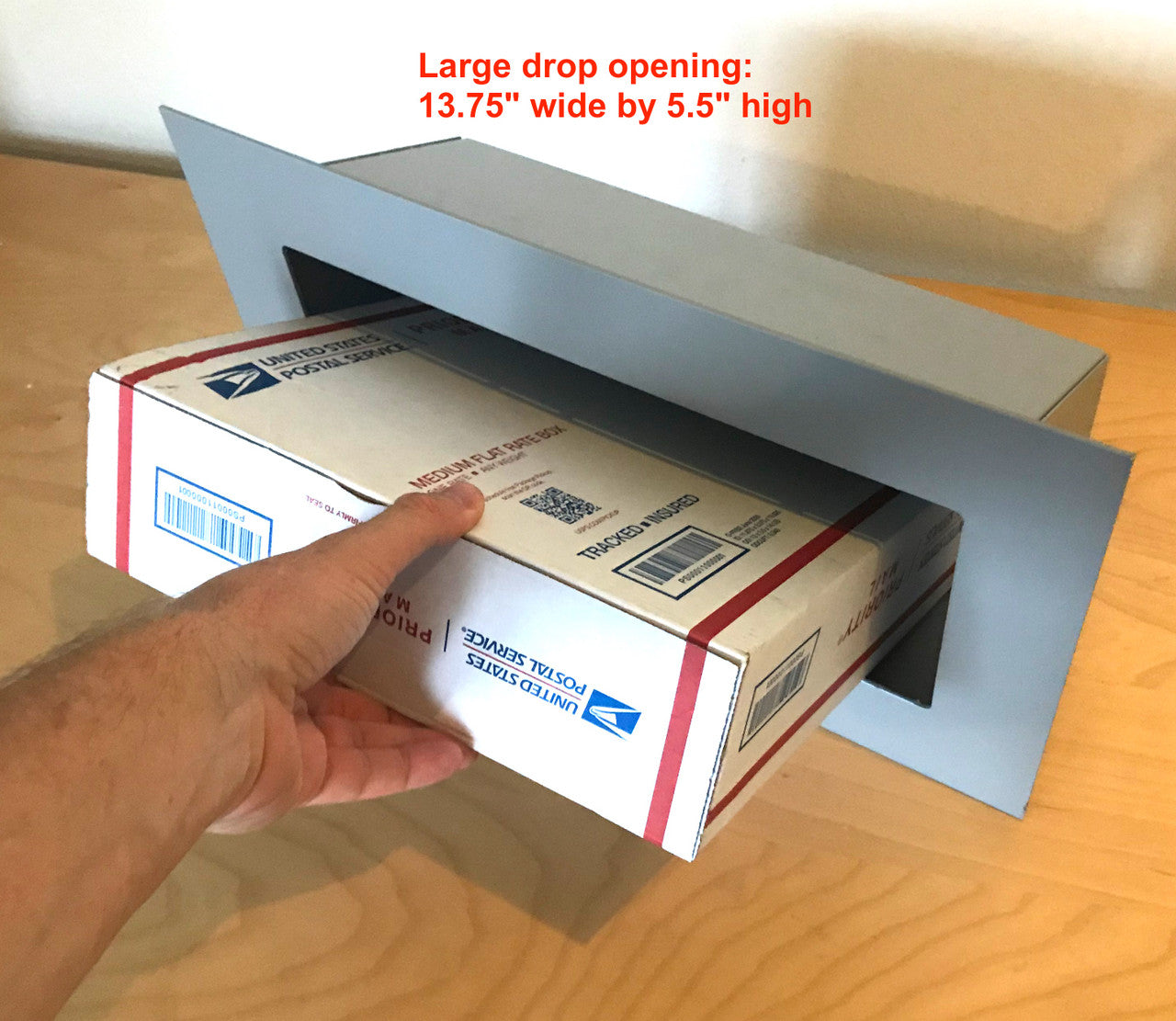 Large Through Wall Mail Drop Slot shown with USPS being dropped