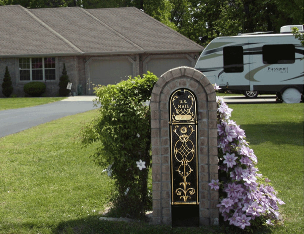 Decorative Locking Package Mailbox in front of house