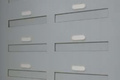 Fire rated though wall mail drop slots