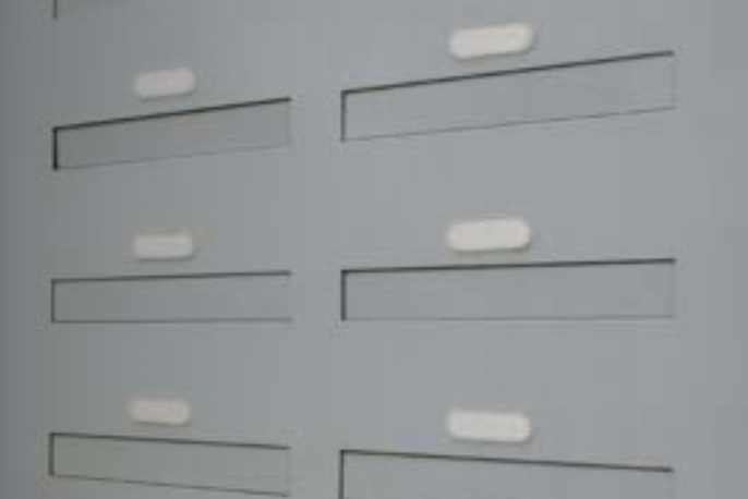 Fire rated though wall mail drop slots