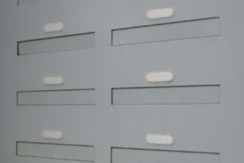 Fire rated though wall mail drop slots